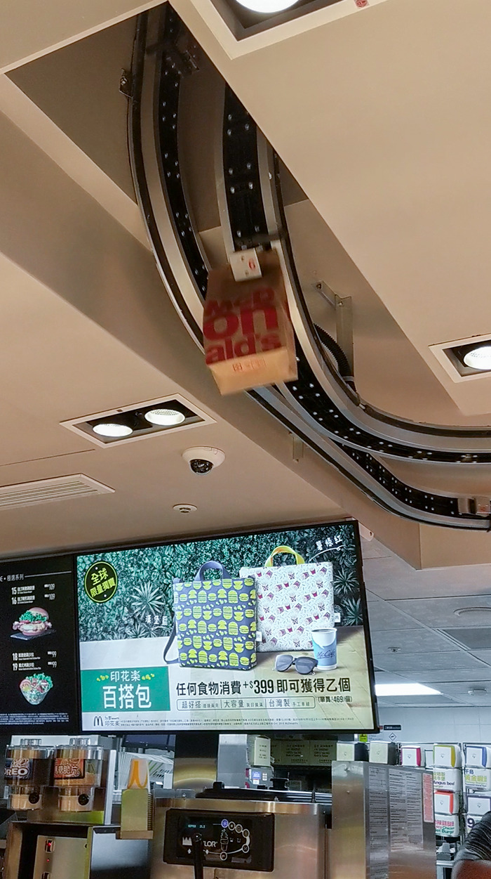This McDonald's Has A Smaller Counter Upstairs, And They Use A Conveyer Belt To Ship Food