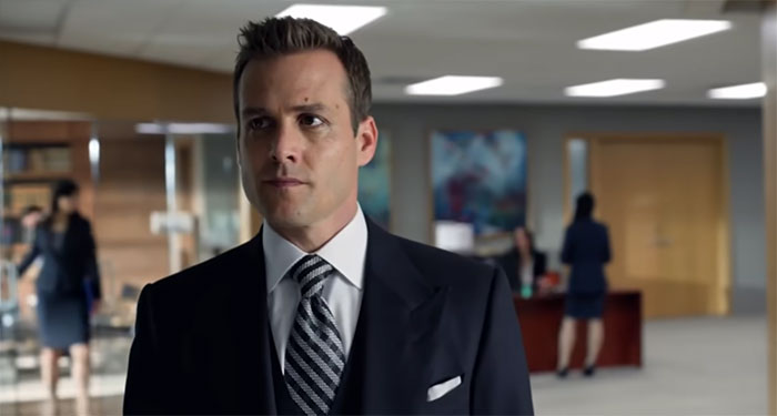 Harvey Specter looking thoughtful