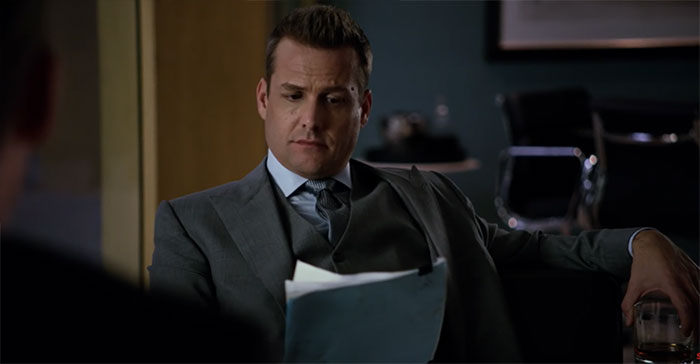 Harvey Specter reading