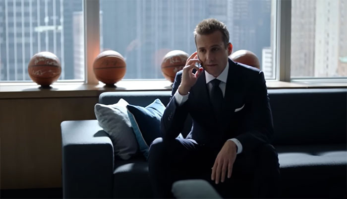 Harvey Specter talking on the phone