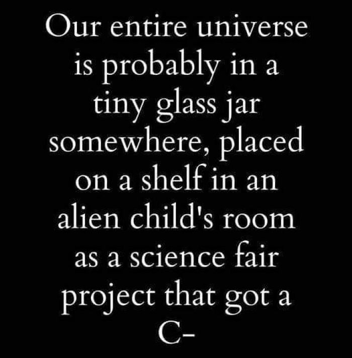 Black background with white text humor about the universe as a science fair project, fitting science humor jokes SEO keyword.