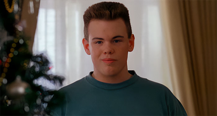 Buzz looking and smiling from Home Alone