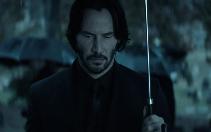 Keanu Reeves wearing black jacket