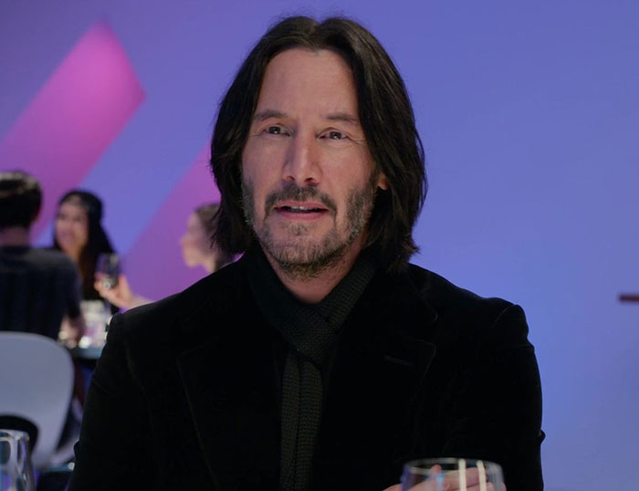 Keanu Reeves wearing black jacket