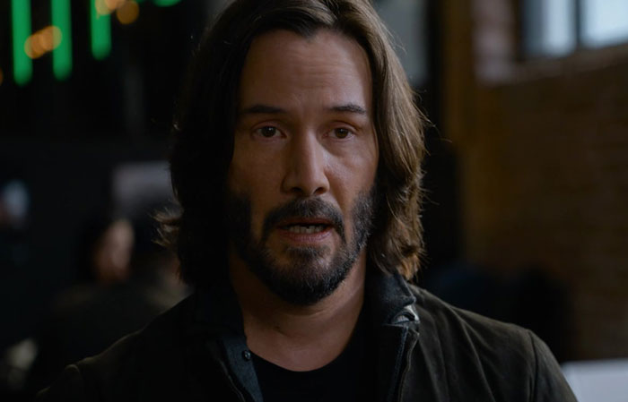 Keanu Reeves wearing black jacket