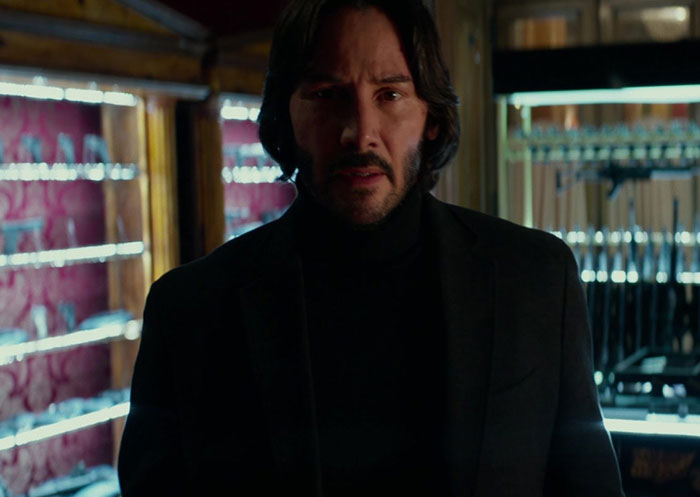 Keanu Reeves wearing suit