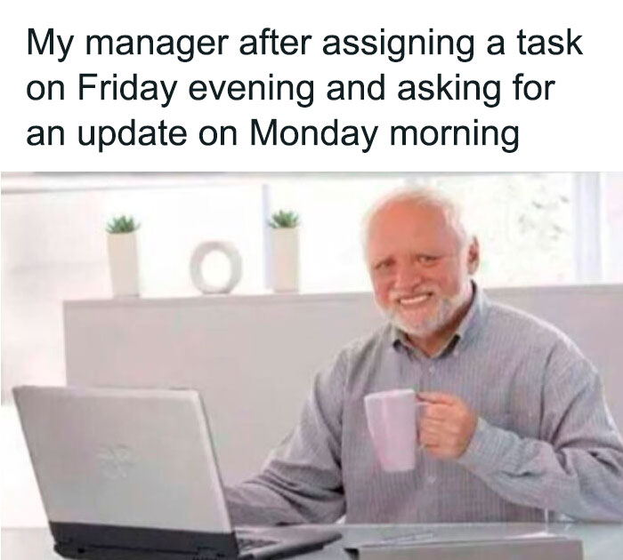 Elderly man smiling awkwardly with a coffee mug in front of a laptop, illustrating Monday memes humor.