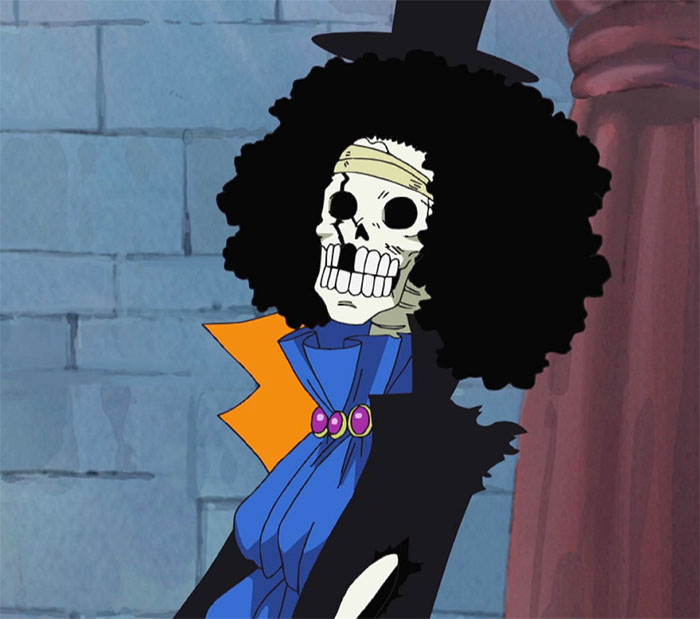 Brook wearing blue and black outfit