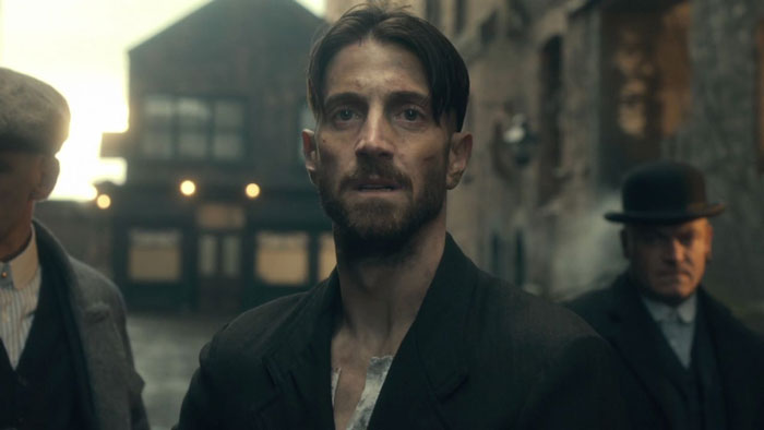 Freddie Thorne looking at something