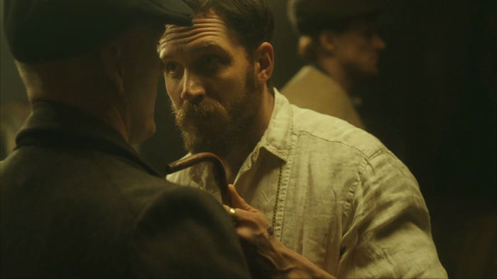 Alfie Solomons looking at a man