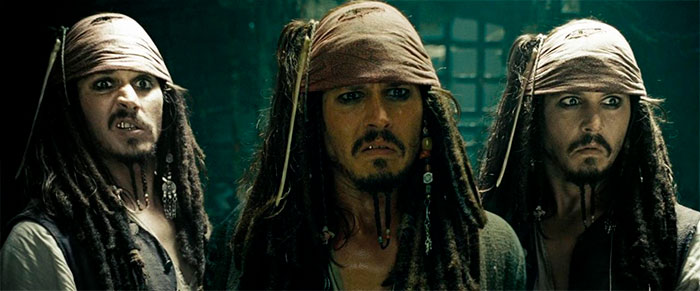 Three men dressed as Jack Sparrow from Pirates of the Caribbean standing together, capturing iconic pirate quotes vibe.
