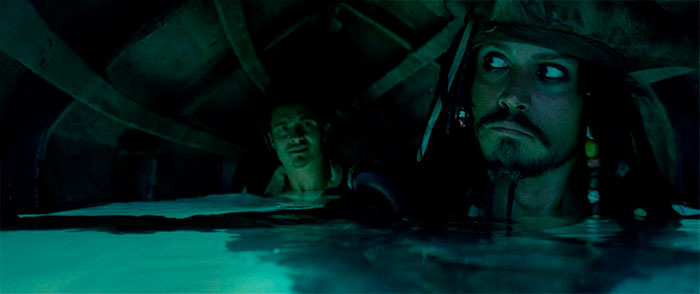 Will Turner and Jack Sparrow hiding underwater beneath a boat scene from Pirates of the Caribbean quotes.