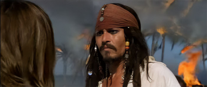 Jack Sparrow talking to Elizabeth Swann in a dramatic scene from Pirates of the Caribbean quotes treasure moments.