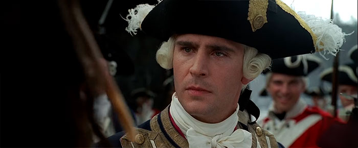 James Norrington in a naval officer uniform from Pirates of the Caribbean, representing iconic Pirates of the Caribbean quotes.