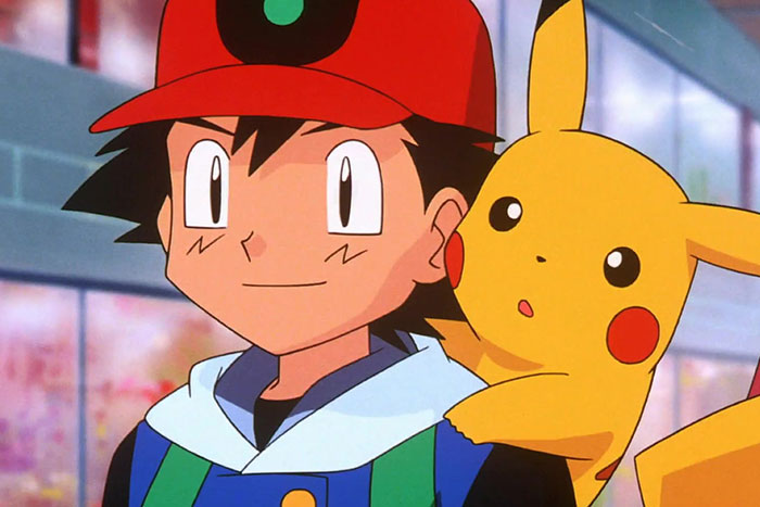Ash Ketchum smiling and Pikachu is on his back - 4