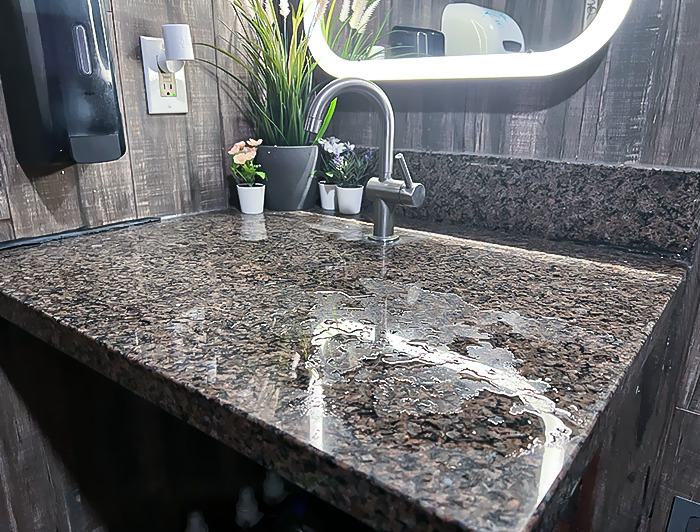 It's Not Even Angled Or Anything To Guide The Drainage. It Just Dribbles Onto The Floor