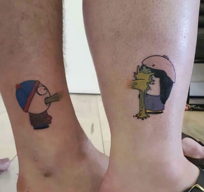 Cartoon-themed tattoos on legs, possibly not well thought through, with characters facing each other.