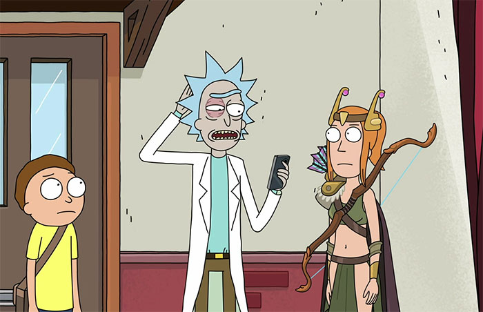 Rick wearing white lab coat, Summer wearing green shirt, Morty wearing yellow shirt