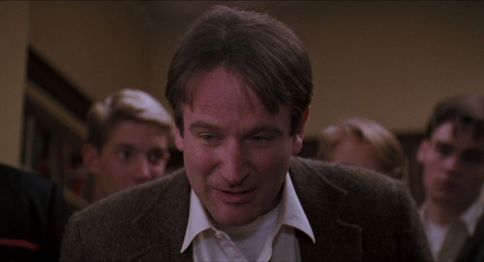 robin williams talking surrounded by people in dead poets society - 25