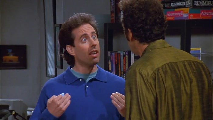 Jerry wearing a blue sweater, delivering one of the funniest Seinfeld quotes that sum up everyday life.