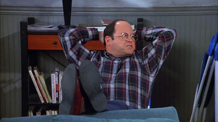 George from Seinfeld wearing a colorful shirt, captured in a relaxed pose highlighting funniest Seinfeld quotes about everyday life.
