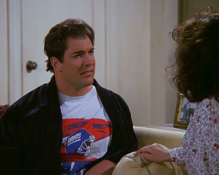 David Puddy in black jacket and gray shirt from Seinfeld, illustrating funniest Seinfeld quotes about everyday life moments.