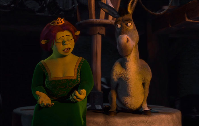 Donkey and Fiona talking inside a dimly lit room, featuring iconic Shrek quotes from the deep swamp.