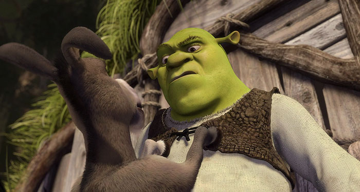 Angry Shrek confronting Donkey outside his swamp house, a classic scene from Shrek quotes about the deep swamp.