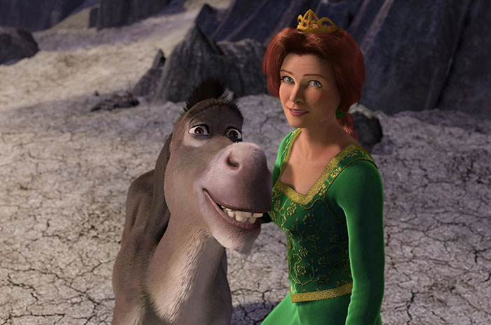 Donkey and Fiona smiling together in the swamp, capturing moments from popular Shrek quotes about the deep swamp.