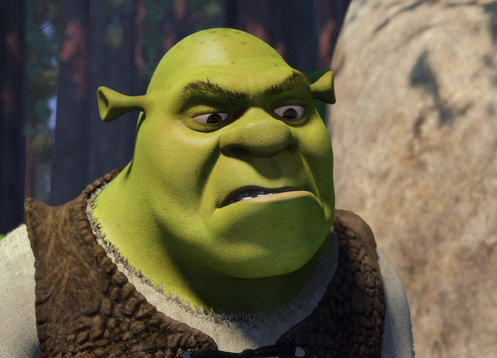 Shrek looking angry in a forest setting, representing iconic Shrek quotes from the deep swamp collection.