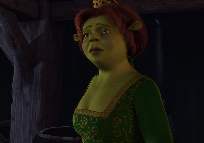 Princess Fiona in green dress inside dark room, featured in 83 Shrek quotes that come from the deep swamp content.