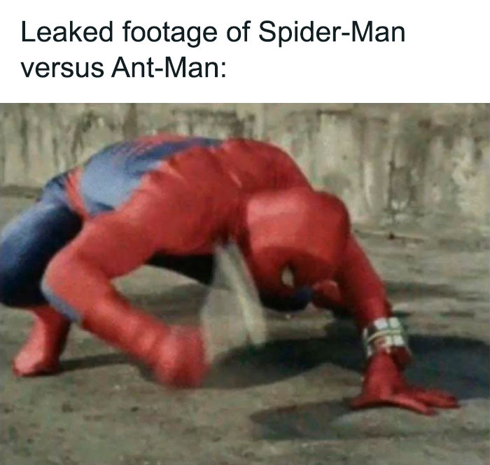 Spiderman in a red suit humorously battling an unseen tiny opponent, mimicking a leaked footage scene.