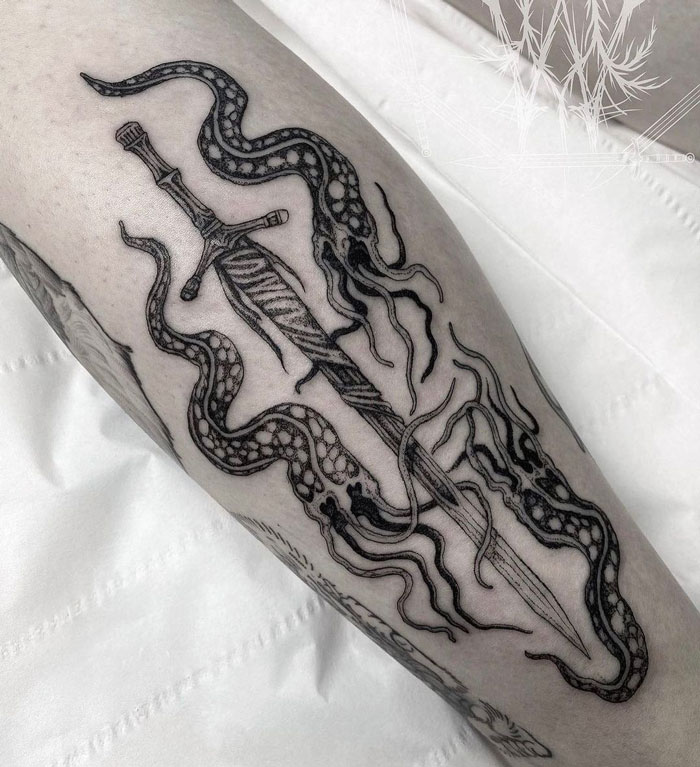 Sword and tentacles tattoo design for hardcore gamer from Bloodborne video game. 