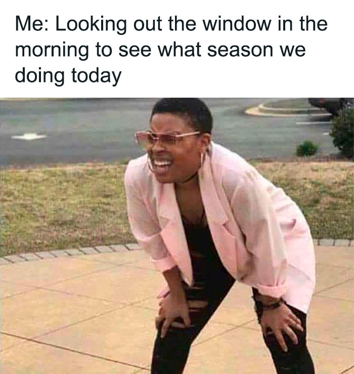 Confused woman looking outside in morning, humorously checking the weather.