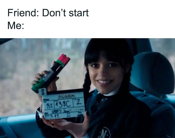 Wednesday Addams holding a clapperboard in a car, with text overlay saying, "Friend: Don't start Me."
