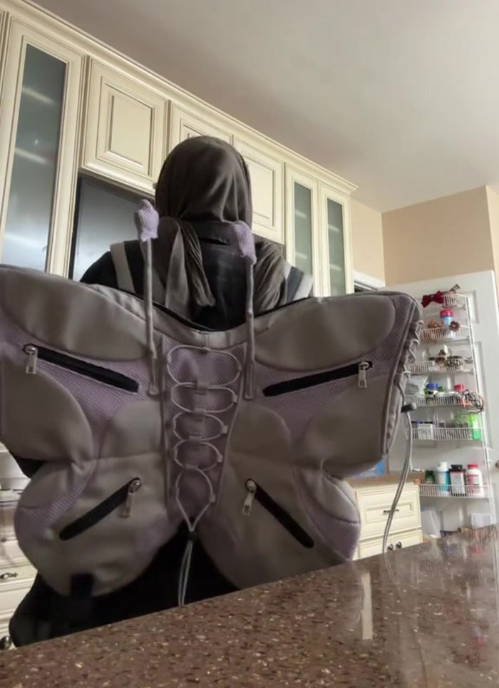 Creator Sparks Massive Debate Over Adults Wearing Backpacks