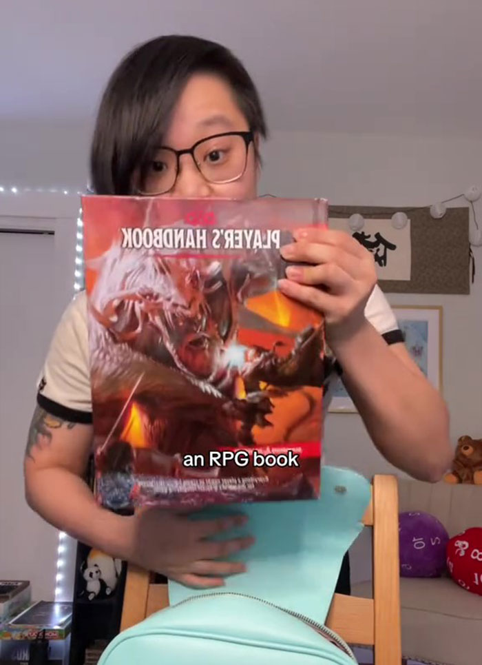 Creator Sparks Massive Debate Over Adults Wearing Backpacks