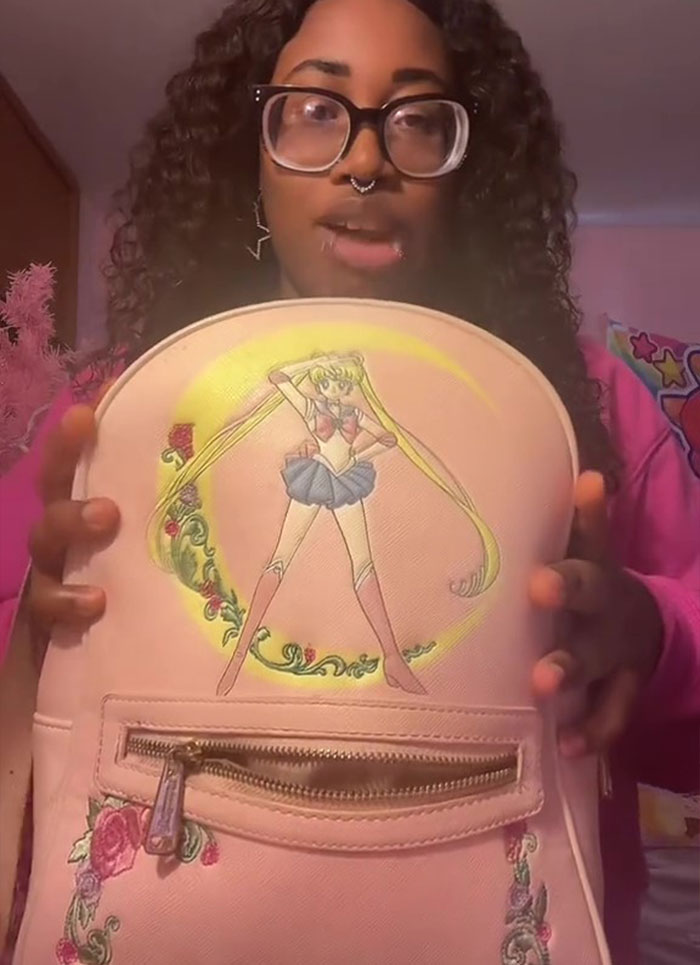 Creator Sparks Massive Debate Over Adults Wearing Backpacks