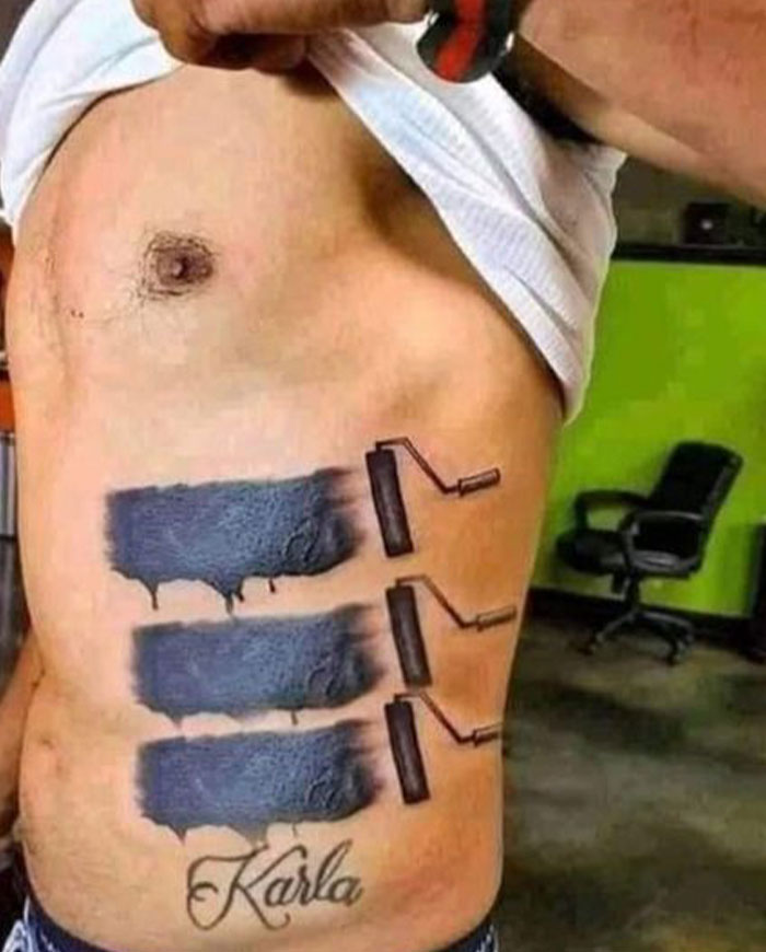 Tattoo fail on a man's side showing three paint rollers with black ink, with the name 'Karla' underneath.