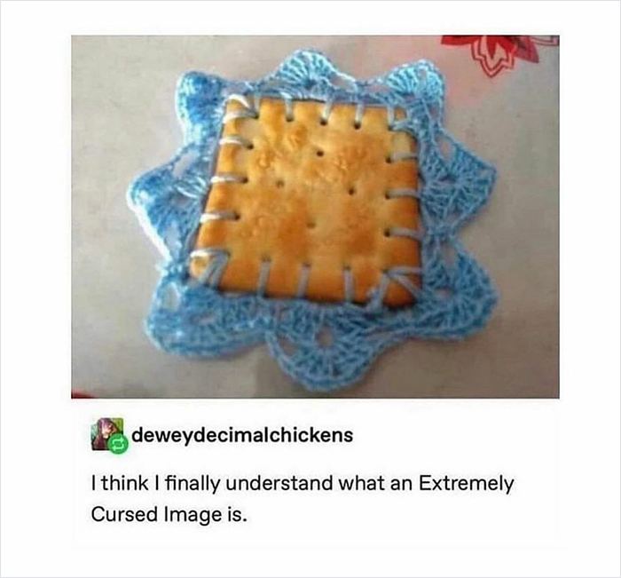 Square cracker awkwardly crocheted into a blue doily, illustrating a hilariously relatable meme about cursed images.
