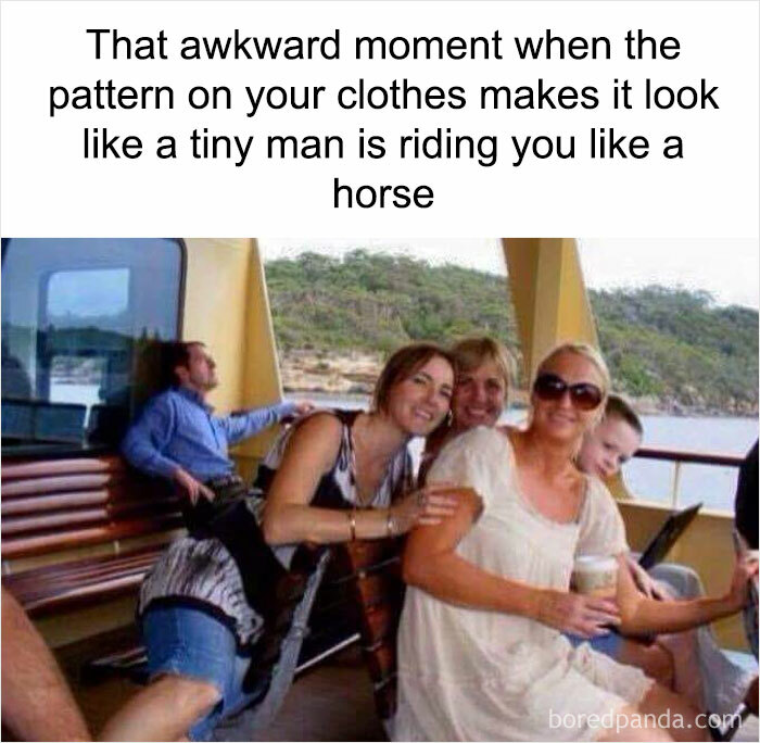 Group photo with a funny optical illusion making it look like a small man is riding someone; example of weird memes.