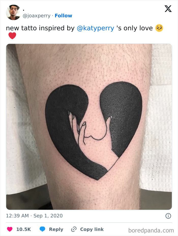 Heart tattoo with hands, inspired by music, suggesting research before getting inked.