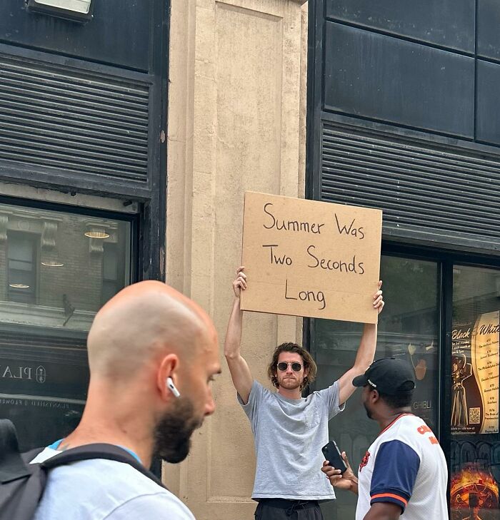 Clever-Dude-With-Sign-Protesting-Annoying-Things