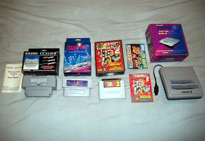 Collection of vintage Super Nintendo game cartridges and accessories that eventually disappeared without notice.