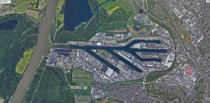 Aerial view showcasing the beauty of well-planned infrastructure in an urban and industrial area.