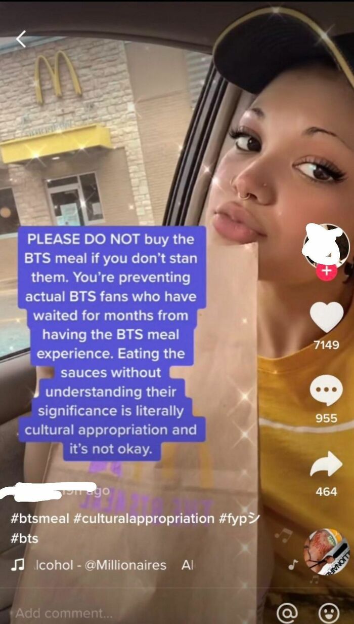 Person holding a McDonald's bag with text about BTS meal and cultural appropriation; embarrassing moment captured.