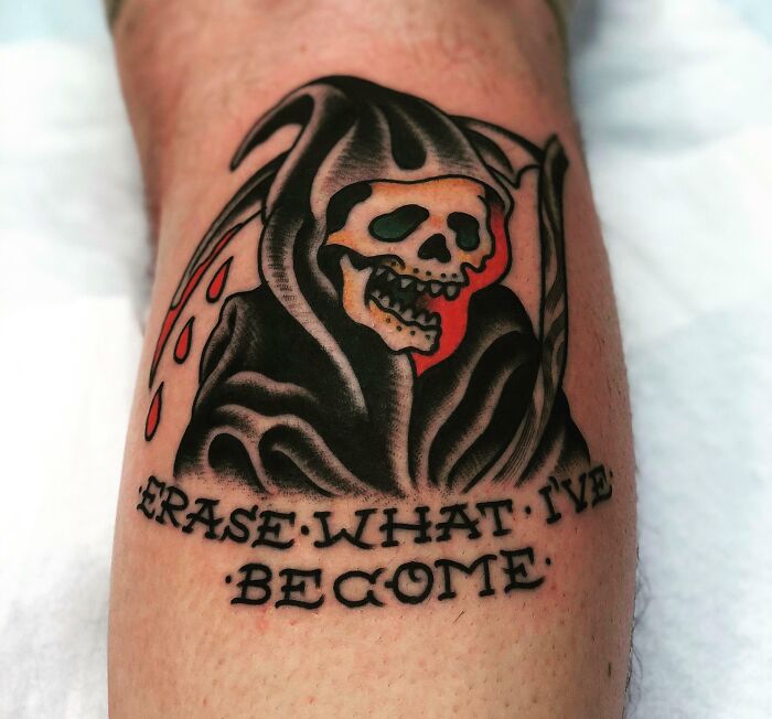 Grim Reaper American traditional tattoo with text "Erase What I've Become" on forearm.