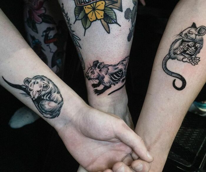 Brother and sister tattoos featuring detailed mice designs on forearms, depicting small and simple sibling art.