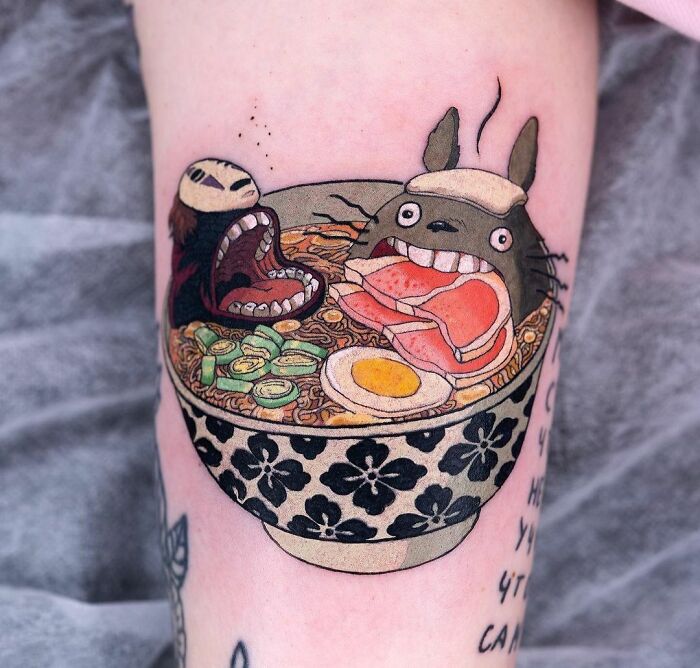 Cartoon tattoo featuring characters from popular animated shows in a ramen bowl design.