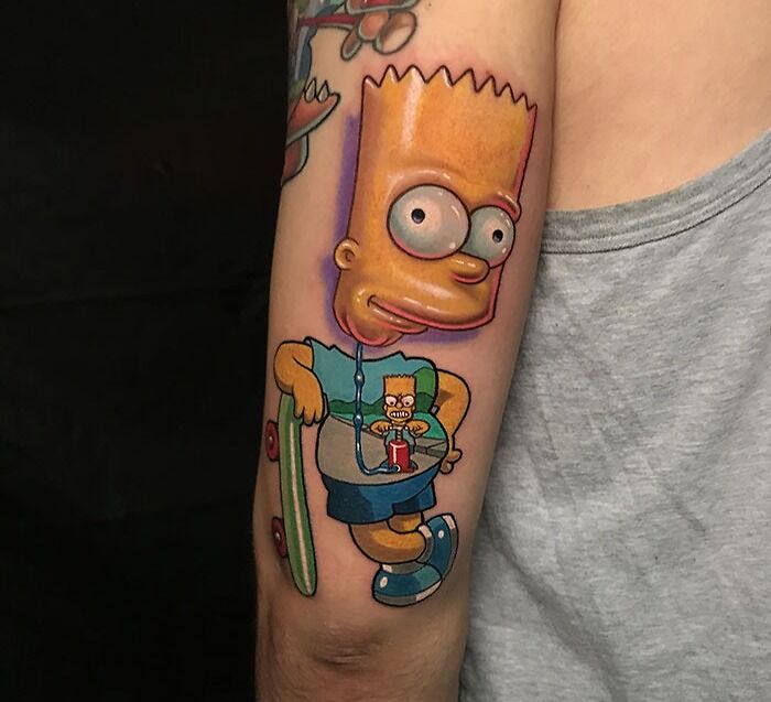Cartoon tattoo of a popular animated character on an arm, showcasing vibrant colors and detailed design.